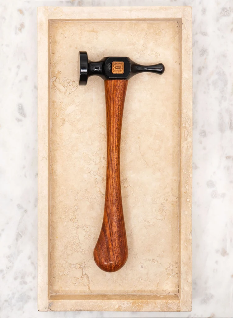 Leather working hammer
